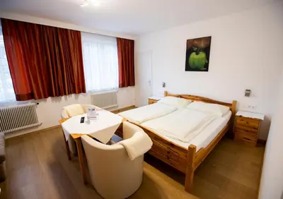 Ein Bett oder Betten in einem Zimmer der Unterkunft Gasthof & Hotel Martinek