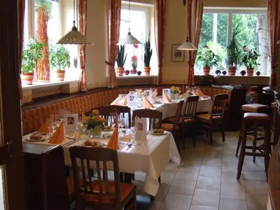 Ein Restaurant oder anderes Speiselokal in der Unterkunft Gasthof & Hotel Martinek