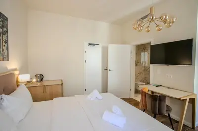 Ein Bett oder Betten in einem Zimmer der Unterkunft Parklane Boutique Hotel - Newly Renovated
