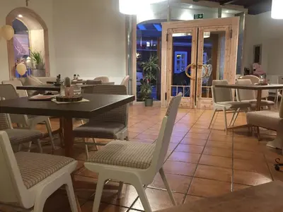 Ein Restaurant oder anderes Speiselokal in der Unterkunft Hotel zur Post