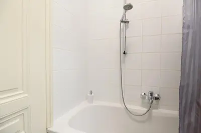 Ein Badezimmer in der Unterkunft City Apartment