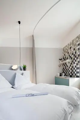 Ein Bett oder Betten in einem Zimmer der Unterkunft grätzlhotel Meidlinger Markt