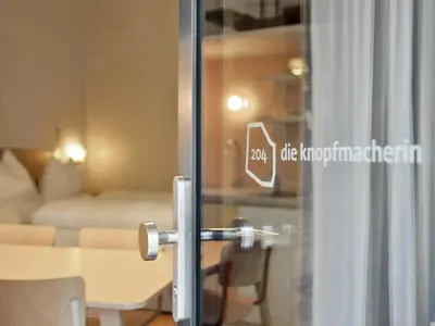 Ein Bett oder Betten in einem Zimmer der Unterkunft grätzlhotel Karmelitermarkt