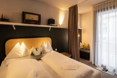 Ein Bett oder Betten in einem Zimmer der Unterkunft grätzlhotel Karmelitermarkt