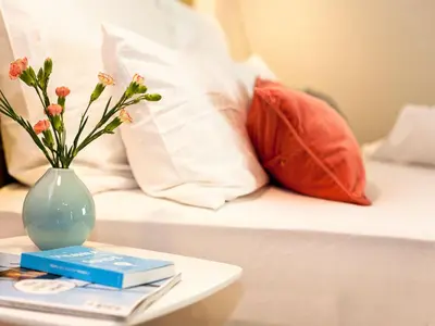 Ein Bett oder Betten in einem Zimmer der Unterkunft grätzlhotel Karmelitermarkt