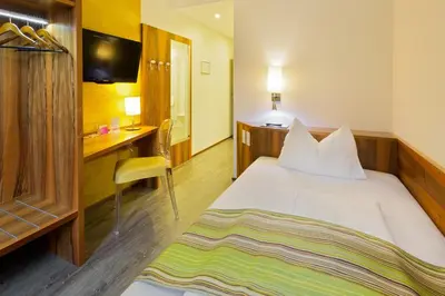 Ein Bett oder Betten in einem Zimmer der Unterkunft Motel Baden