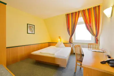 Ein Bett oder Betten in einem Zimmer der Unterkunft Motel Baden