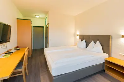 Ein Bett oder Betten in einem Zimmer der Unterkunft Motel Baden