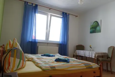 Ein Bett oder Betten in einem Zimmer der Unterkunft Gasthaus Helena