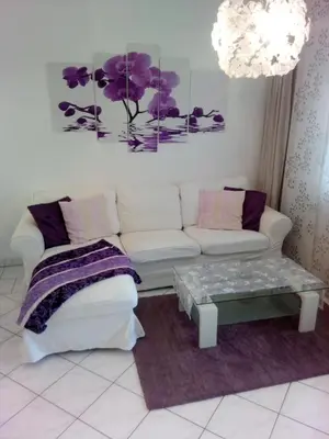 Ein Bett oder Betten in einem Zimmer der Unterkunft Orchidee