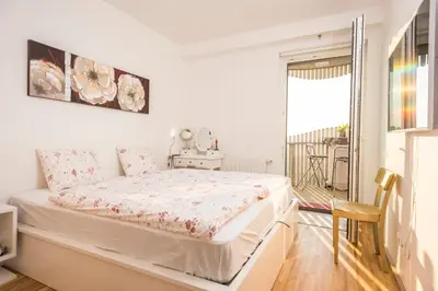Ein Bett oder Betten in einem Zimmer der Unterkunft Sky View Apartment Vienna