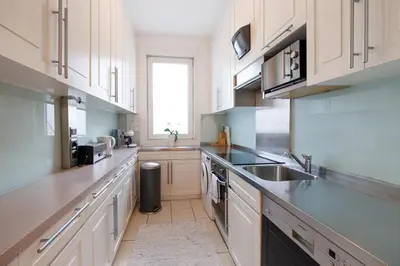 Küche/Küchenzeile in der Unterkunft Operastreet City-Center Premium Apartment
