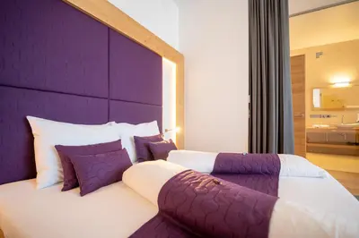 Ein Bett oder Betten in einem Zimmer der Unterkunft Gut Leithaberg