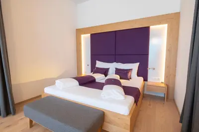 Ein Bett oder Betten in einem Zimmer der Unterkunft Gut Leithaberg