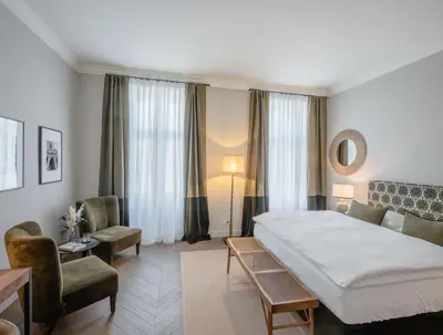 Ein Bett oder Betten in einem Zimmer der Unterkunft Roosevelt Stadthaus