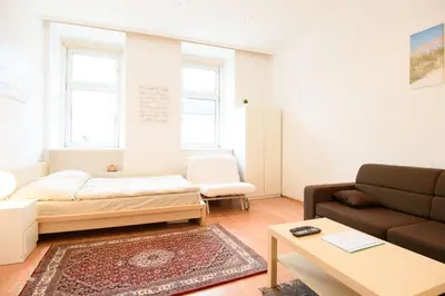 Ein Bett oder Betten in einem Zimmer der Unterkunft Vienna City Apartment Dampfgasse