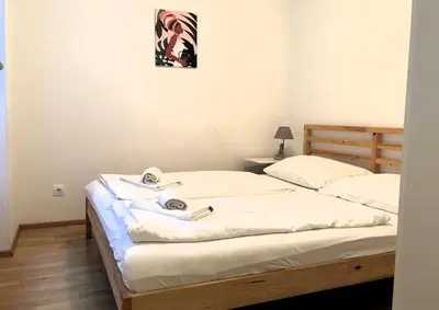 Ein Bett oder Betten in einem Zimmer der Unterkunft Casa Nostra - Ruhige Stadtwohnung mit Balkon