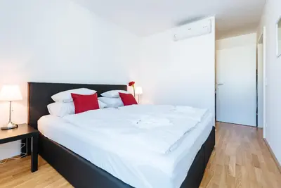 Ein Bett oder Betten in einem Zimmer der Unterkunft Vienna Mainstation - 10 Minutes to Citycenter - Apartments with Aircondition