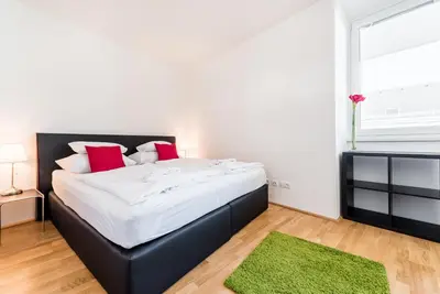 Ein Bett oder Betten in einem Zimmer der Unterkunft Vienna Mainstation - 10 Minutes to Citycenter - Apartments with Aircondition