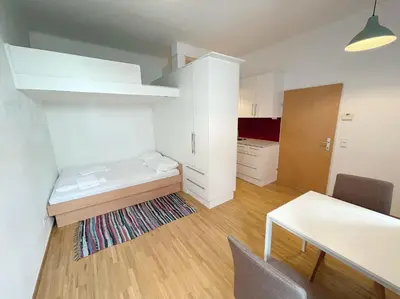 Ein Bett oder Betten in einem Zimmer der Unterkunft Metro Apartments Vienna