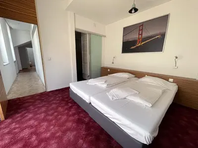 Ein Bett oder Betten in einem Zimmer der Unterkunft Metro Apartments Vienna