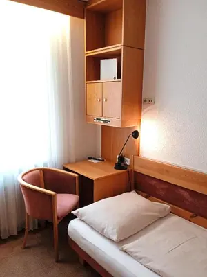 Ein Bett oder Betten in einem Zimmer der Unterkunft Pension Müller Gartner