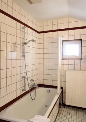 Ein Badezimmer in der Unterkunft Pension Müller Gartner