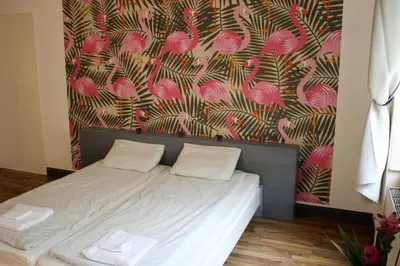 Ein Bett oder Betten in einem Zimmer der Unterkunft Pension Wienderland