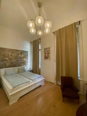 Ein Bett oder Betten in einem Zimmer der Unterkunft Pension Wienderland