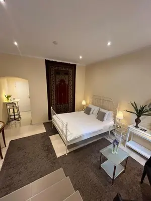 Ein Bett oder Betten in einem Zimmer der Unterkunft St Martin Apartment