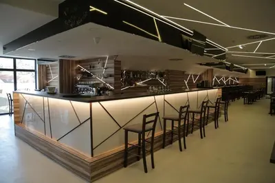 Ein Restaurant oder anderes Speiselokal in der Unterkunft Lifestyle Hotel Leithana