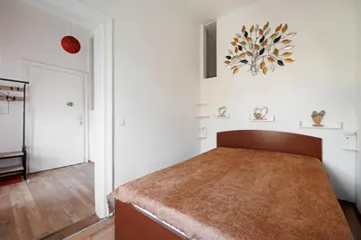 Ein Bett oder Betten in einem Zimmer der Unterkunft Vintagehome Naschmarkt