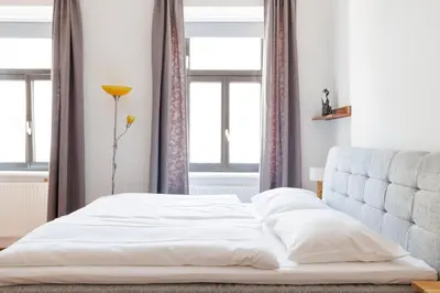 Ein Bett oder Betten in einem Zimmer der Unterkunft Vintagehome Naschmarkt