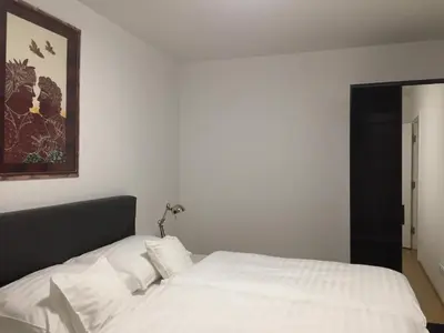 Ein Bett oder Betten in einem Zimmer der Unterkunft Terrasse Wohnungen mit parking in Zentrum