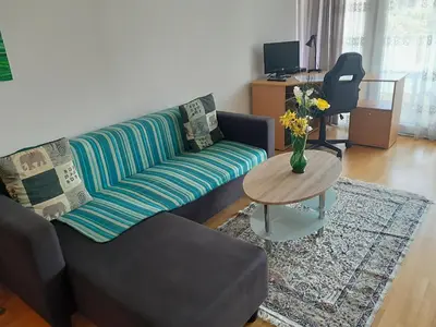 Ein Sitzbereich in der Unterkunft Serviced Apartment with Sunny Balcony