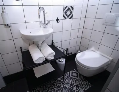 Ein Badezimmer in der Unterkunft Alt Wien