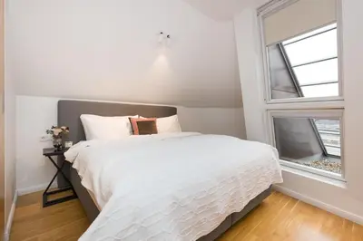 Ein Bett oder Betten in einem Zimmer der Unterkunft RAFAEL KAISER - Premium Apartments City Centre - Contactless Check-In