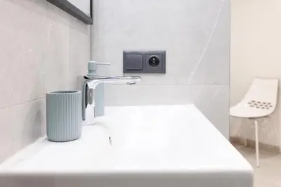 Ein Bett oder Betten in einem Zimmer der Unterkunft Apartment house in Vienna