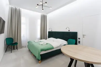 Ein Bett oder Betten in einem Zimmer der Unterkunft Apartment house in Vienna