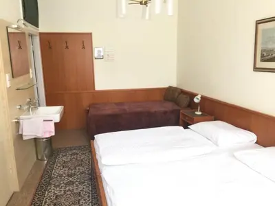Ein Bett oder Betten in einem Zimmer der Unterkunft Pension Reimer