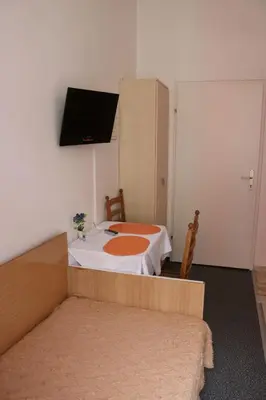 Ein Bett oder Betten in einem Zimmer der Unterkunft Pension Reimer