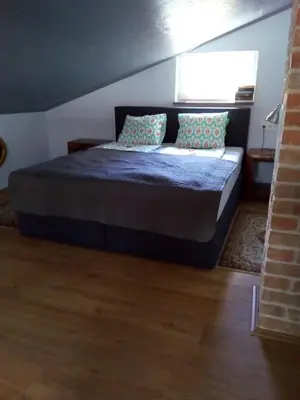 Ein Bett oder Betten in einem Zimmer der Unterkunft Bootshaus