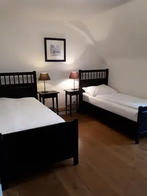 Ein Bett oder Betten in einem Zimmer der Unterkunft Wildenauer's