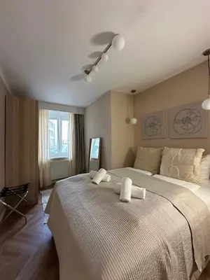 Ein Bett oder Betten in einem Zimmer der Unterkunft 1st City Apartments
