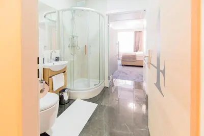 Ein Badezimmer in der Unterkunft 1st City Apartments
