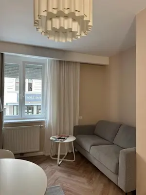 Ein Sitzbereich in der Unterkunft 1st City Apartments