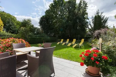 Ein Garten an der Unterkunft Pension Elfy