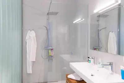 Ein Badezimmer in der Unterkunft Grand Soho Apartment