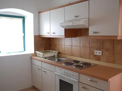 Küche/Küchenzeile in der Unterkunft Holiday Home Hofgasse-2 by Interhome