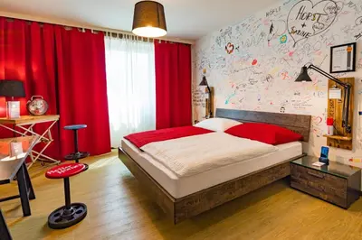 Ein Bett oder Betten in einem Zimmer der Unterkunft Hotel Freizeittempel